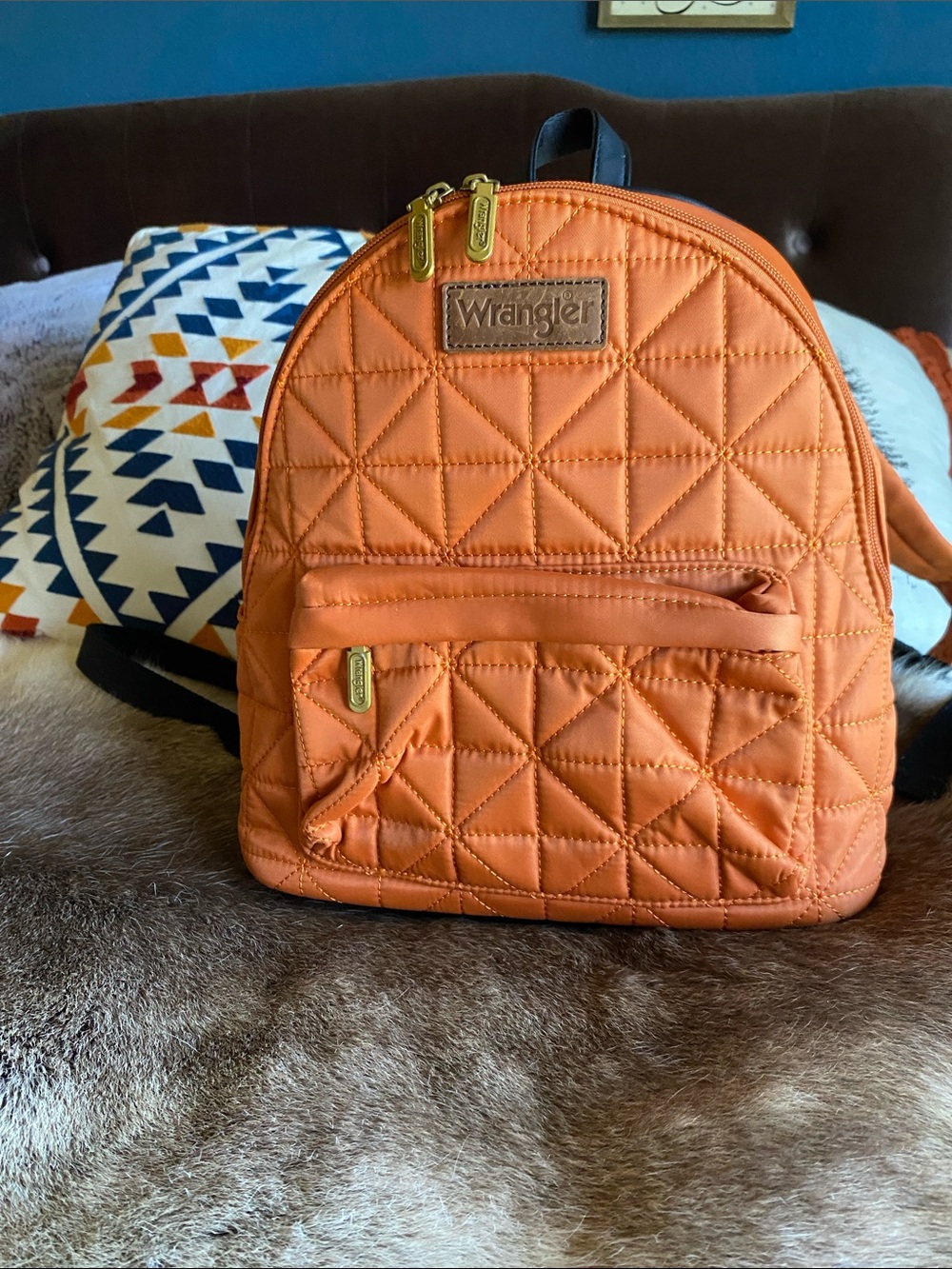Wrangler Quilted Orange Mini Backpack with Gold Hardware